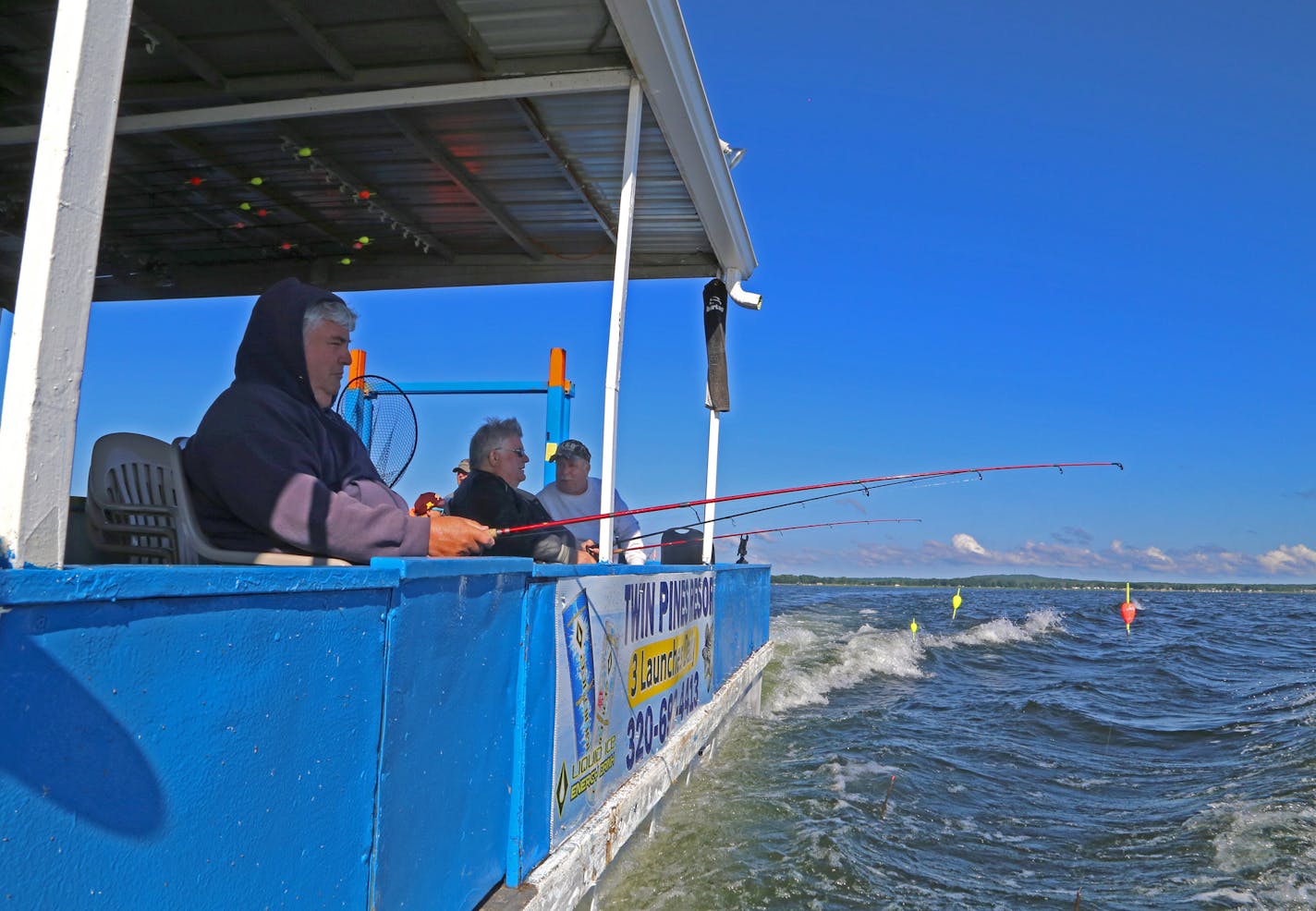 A trio of longtime Twin Cities fishing buddies that included brothers Roger and Ron St. Clair, along with Greg Daszkiewicz, held their rods out of the water as a Mille Lacs launch motored to a new fishing location last week. Fishing was good, but most walleyes that were boated were small.