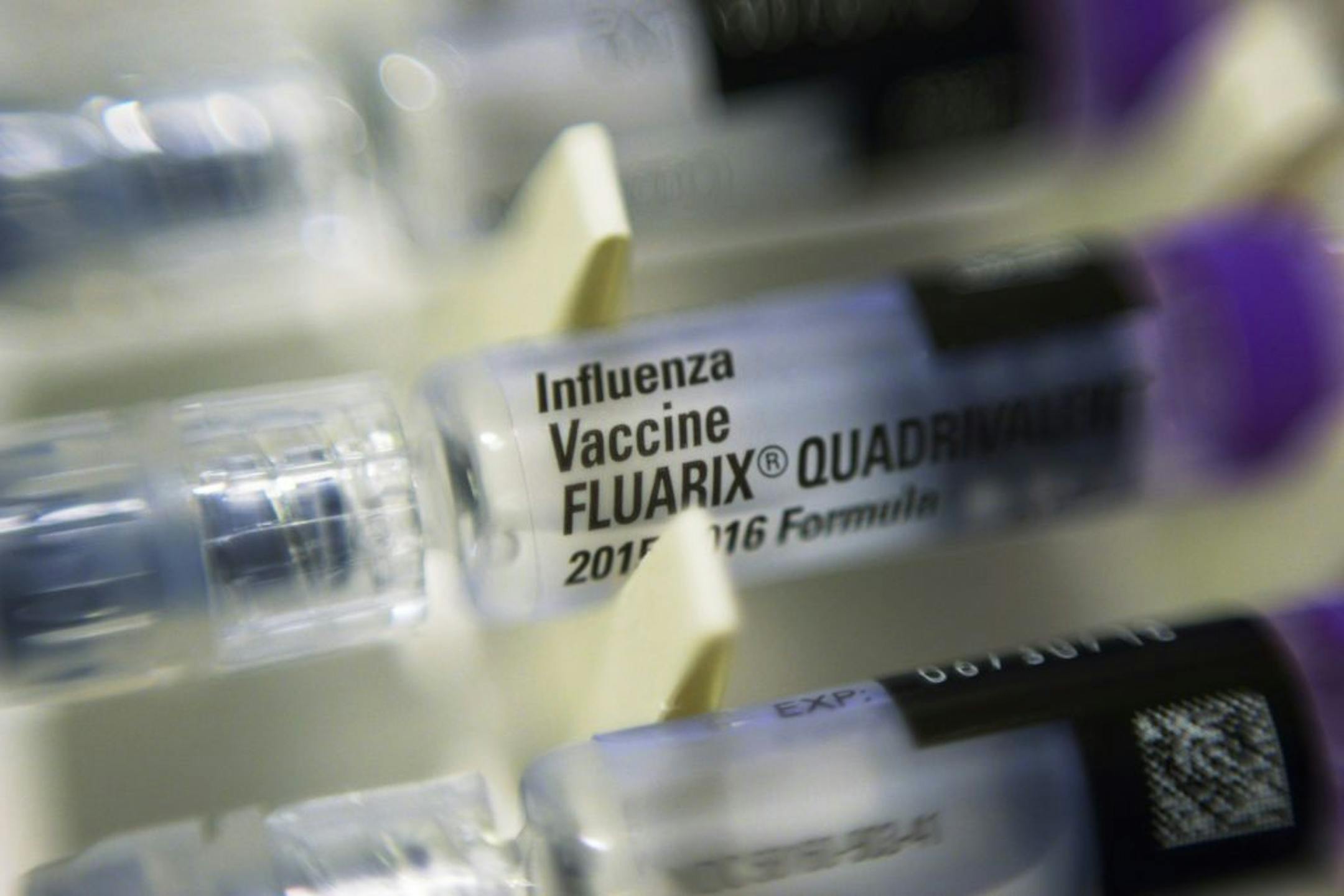 FILE - This Thursday, Nov. 12, 2015 file photo shows single dosage syringes of the Fluarix quadrivalent influenza virus vaccine in New York. According to numbers presented at a medical meeting in Atlanta on Wednesday, Feb. 24, 2016, the flu vaccine is doing a better job in 2016.