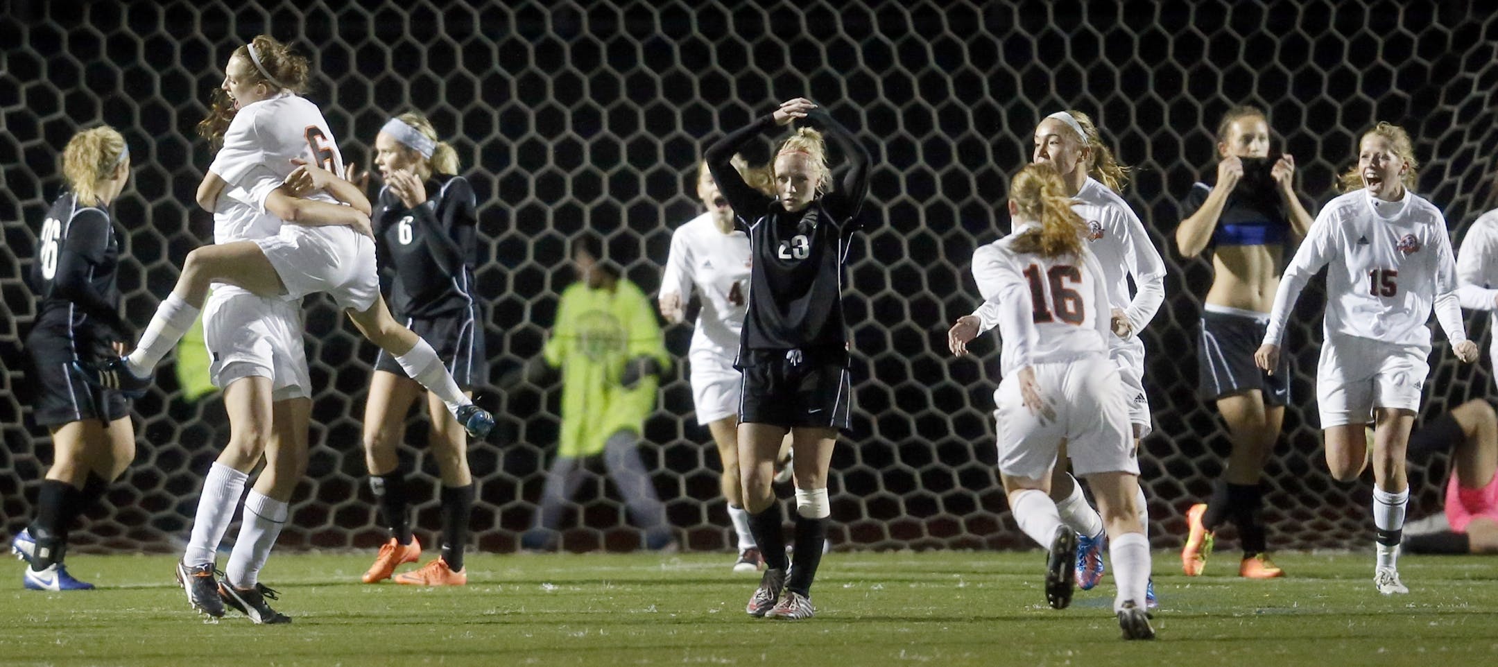 White Bear Lake's Madison Scheer (6) jumped into the arms of Rachel DeGardner after DeGardner scored goal in the second half.