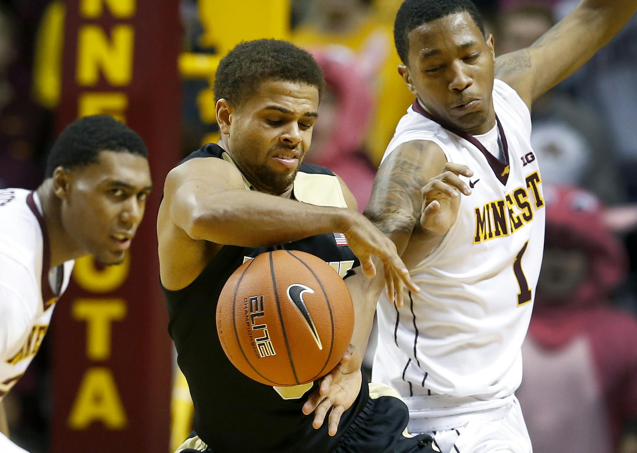P.J. Thompson (3) and Dupree McBrayer (1) fought for the ball in the second half. ] CARLOS GONZALEZ cgonzalez@startribune.com - January 27, 2016, Minneapolis, MN, Williams Arena, NCAA Basketball, University of Minnesota Gophers vs. Purdue Boilermakers