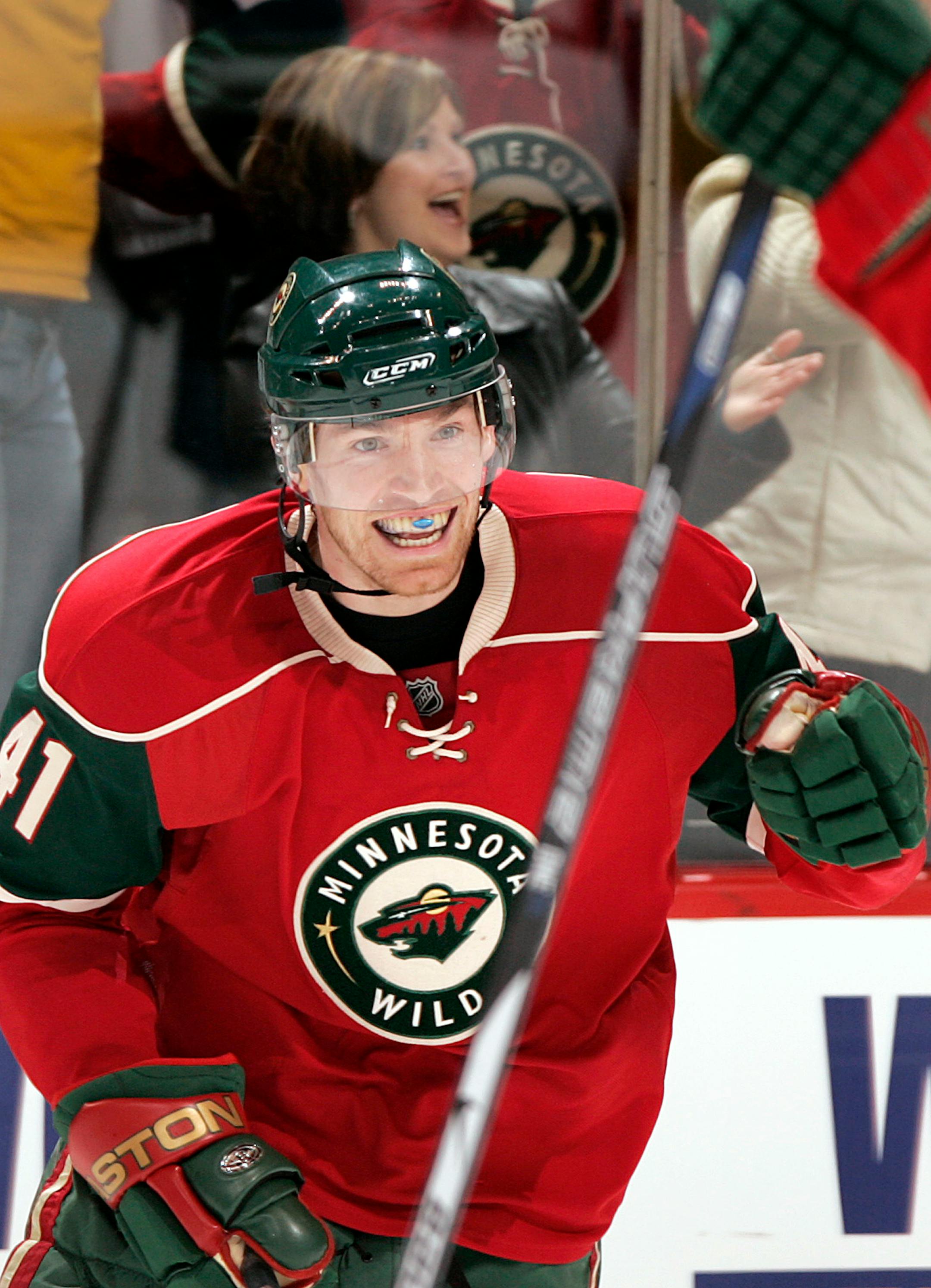 The Wild's Martin Skoula celebrated after his game-winning goal Sunday in overtime against Los Angeles.