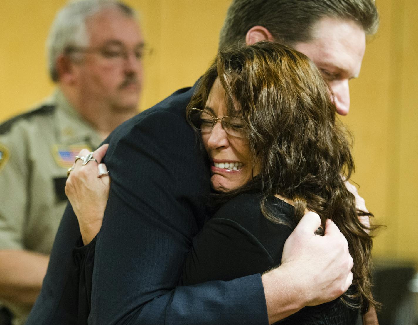 Lavonne Acre, mother of Levi Acre-Kendall, embraced defense attorney Doug Hazelton after the verdict. ] Mark Vancleave - mark.vancleave@startribune.com * Levi Acre-Kendall was acquitted of all three charges of reckless and intentional homicide in the stabbing of a Wisconsin fisherman on Monday, Feb. 14, 2015 at the Polk County Court in Balsam Lake, Wisc. ORG XMIT: MIN1512141215170223