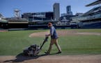Ian Almquist, with the Minnesota Twins grounds crew, mowed the lawn at Target Field, Friday, March 6, 2020 in Minneapolis, MN.