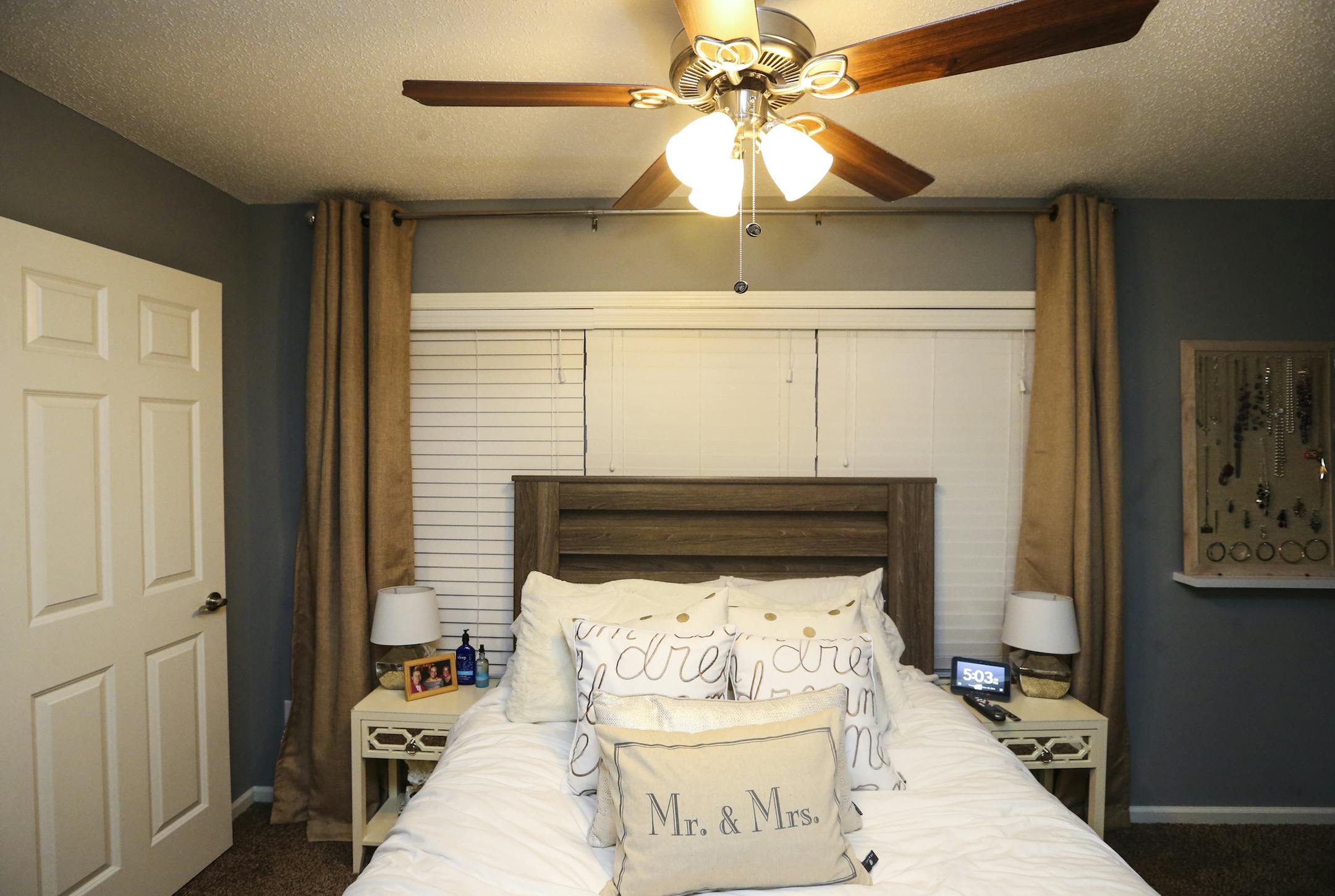 Missi and Tyler Franz's master bedroom in their new home in Columbia Heights, Minn. ] RENÉE JONES SCHNEIDER reneejones@startribune.com The city of Columbia Heights bought some of the ugliest, skankiest houses in the city. They tore them down and built new, sleek 1200 sq ft two stories designed for those conflicted young homebuyers torn between the city and the suburbs .Photographs taken on Tuesday, December 23, 2014, in Columbia Heights, Minn.
