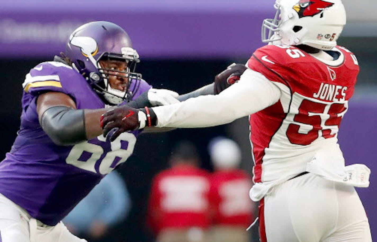 Vikings tackle T.J. Clemmings (68) blocked Chandler Jones (55) in the third quarter.