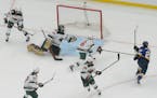 Blues center Jordan Kyrou (25) snapped a shot past Wild goalie Marc-Andre Fleury for the first of his two goals in St. Louis' 5-2 Game 4 victory in a 
