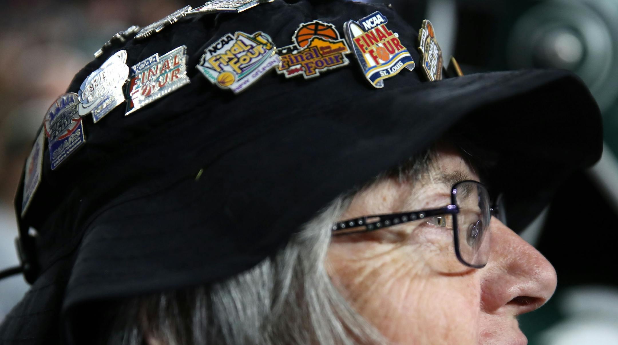 Dorothy Straney wore a hat with all the 31 pins from the Finals Fours she attended. Straney is from Spring Hill, Kansas, at her 31st Final Four.