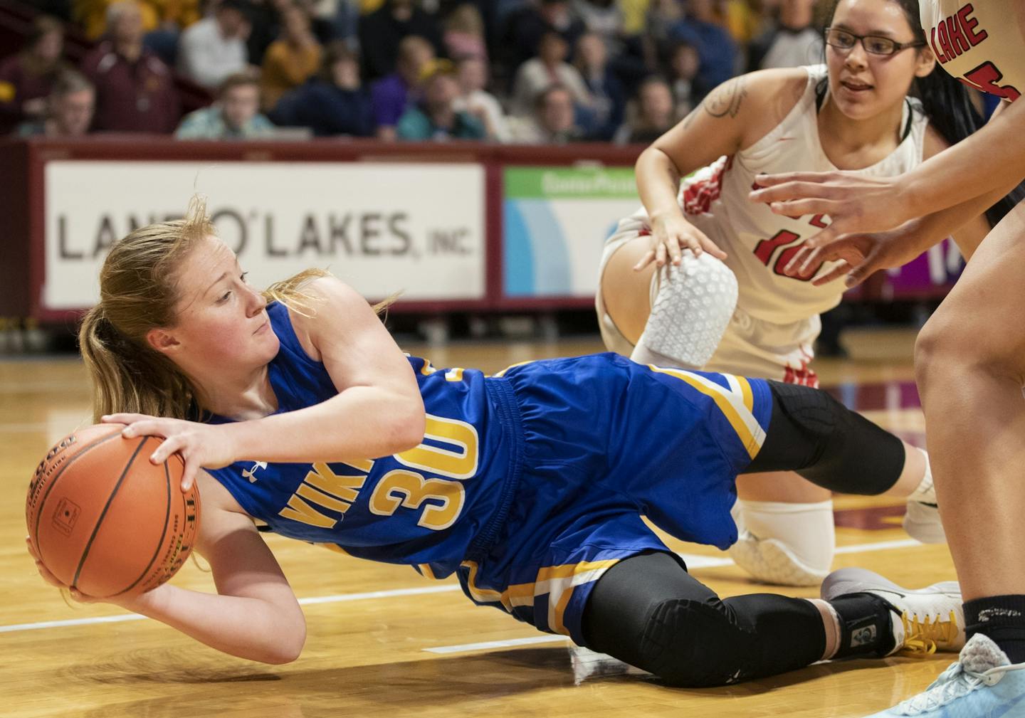 Ireland Stassen (30) of Minneota recovered a loose ball in the first half of her team's quarterfinal game against Red Lake on Thursday. The Vikings are the No. 1 seed in Class 1A.