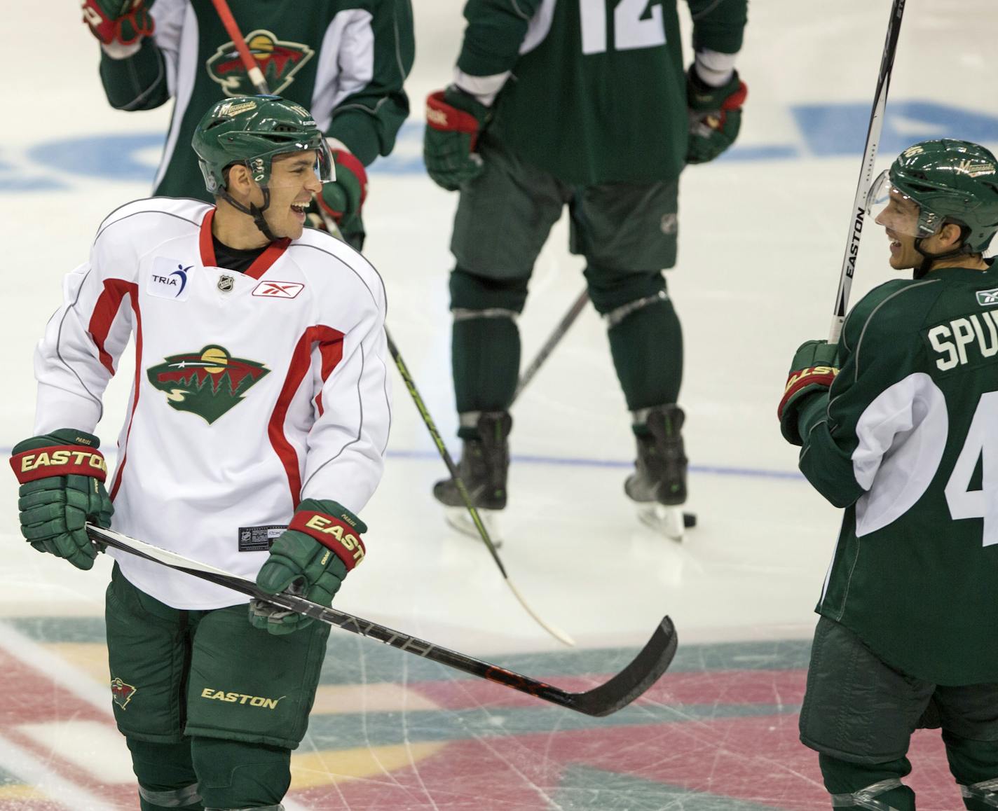 1st Day of School - The Minnesota Wild held their first day of training camp Friday at the Xcel Center in St. Paul. Here, forward Zach Parise (left) and Jared Spurgeon joke between plays during a scrimmage. ] Brian.Peterson@startribune.com St. Paul, MN - 9/18/2015