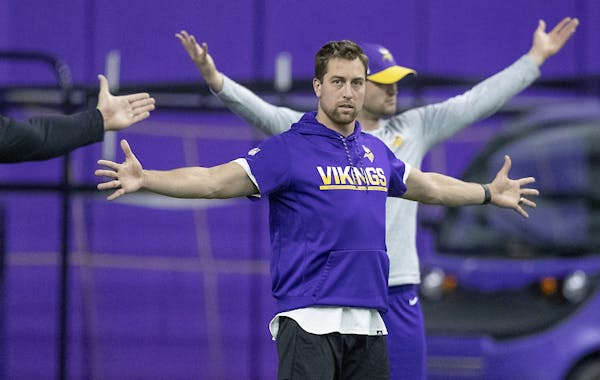 Vikings wide receiver Adam Thielen stretched before practice on Tuesday.