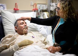 Celese Montemayor spends time with her husband Juan Friday, June 28, 2024 at the Regions Hospital Burn Center in St. Paul, Minn. Montemayor received 2