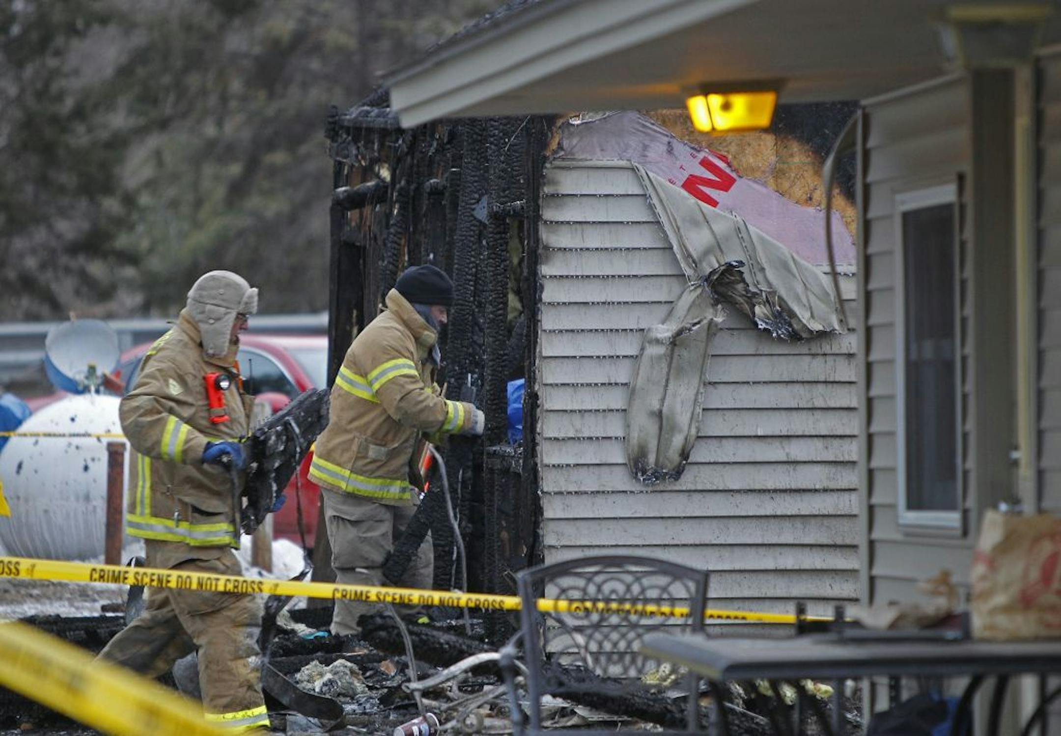 Firefighters worked the scene of a fatal fire in Chanhassen on Monday, March 17, 2014.