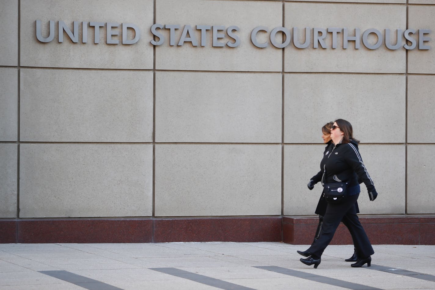 Alison Feigh, child safety specialist at the Jacob Wetterling foundation and a former classmate of Jacob's, and Jane Straub, also with the Wetterling Resource Center, walked into the Federal Courthouse for Monday's sentencing of Danny Heinrich.