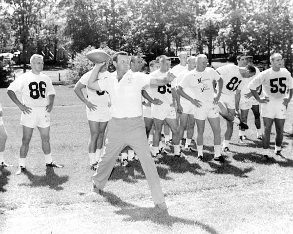 Coach Norm Van Brocklin showed off his throwing arm as the Vikings gathered for their first training camp in Bemidji, Minn., in July of 1961.