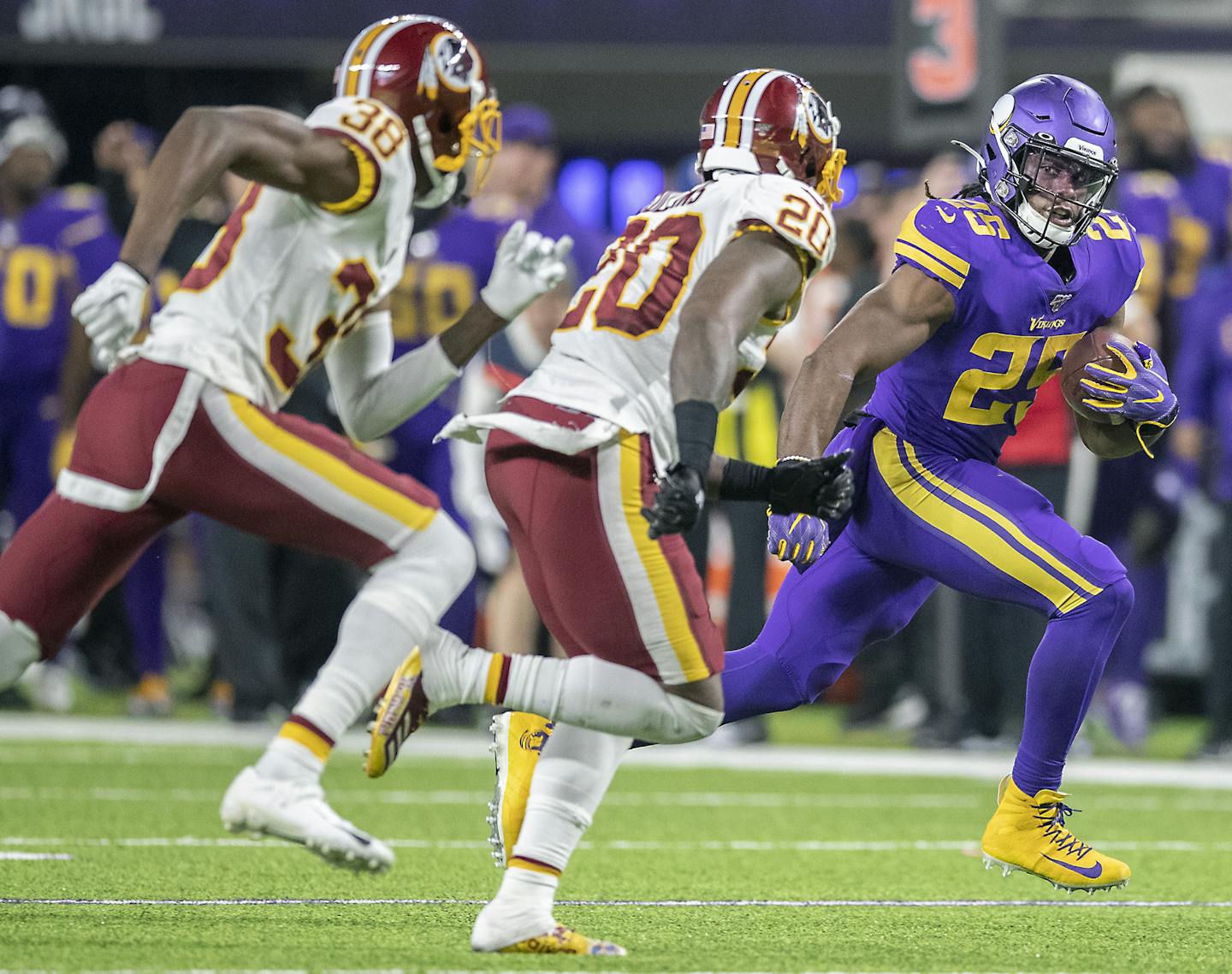 Vikings running back Alexander Mattison ran with the ball looking back at defenders Washington Redskins defensive back Simeon Thomas, left, and strong safety Landon Collins during the fourth quarter. ] ELIZABETH FLORES &#x2022; liz.flores@startribune.com Vikings take on the Washington Redskins at U.S. Bank Stadium, Thursday, October 24, 2019 in Minneapolis, MN.