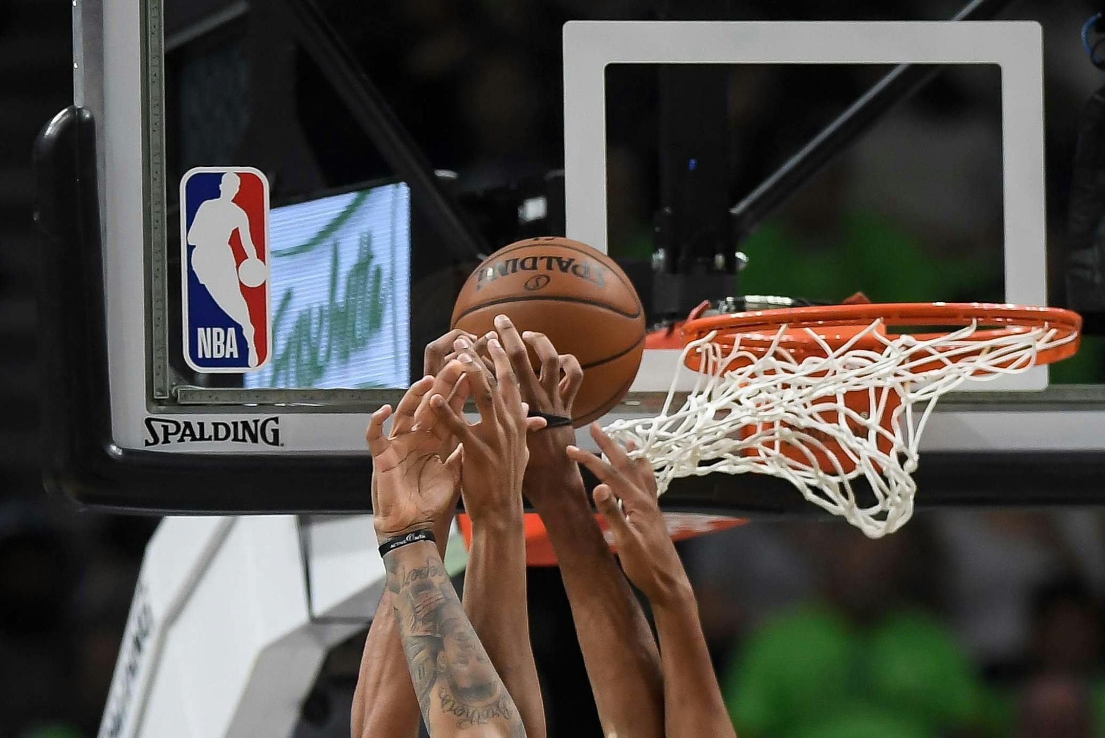 Phoenix Suns forward Marquese Chriss (0), Minnesota Timberwolves center Karl-Anthony Towns (32) and forward Taj Gibson (67) battled for a rebound in the second quarter Saturday. ] AARON LAVINSKY ï aaron.lavinsky@startribune.com The Minnesota Timberwolves played the Phoenix Suns on Saturday, Dec. 16, 2017 at Target Center in Minneapolis, Minn.