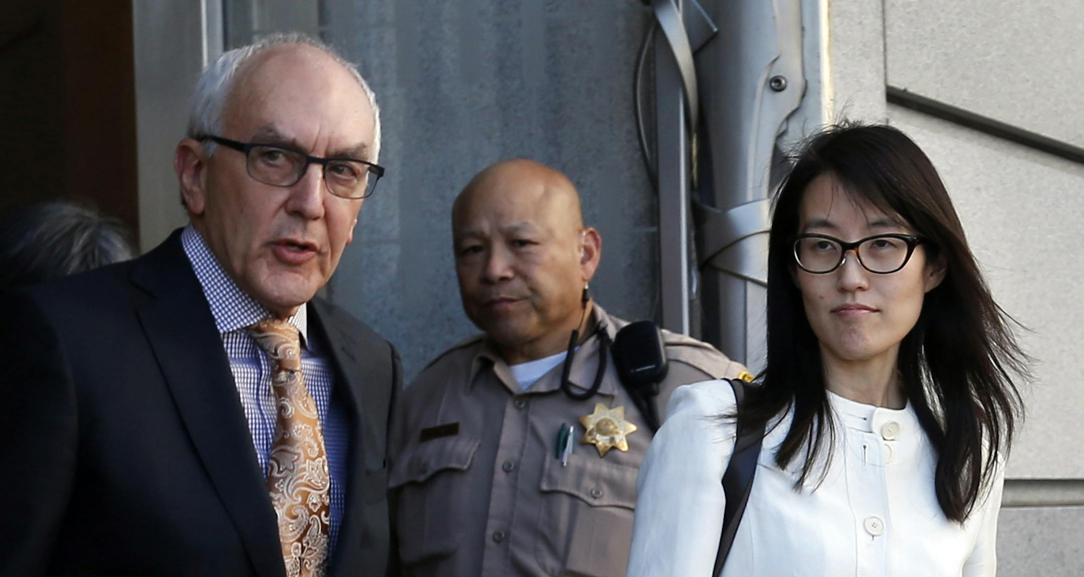 Ellen Pao leaves Superior Court in San Francisco alongside her attorney Alan Exelrod on Friday, March 27, 2015, after losing in her gender discrimination lawsuit against Kleiner Perkins Caufield & Byers. (Karl Mondon/Bay Area News Group/TNS) ORG XMIT: 1166259