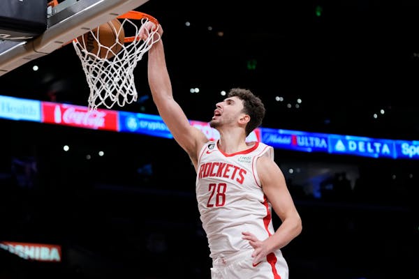 Houston Rockets' Alperen Sengun dunks during the second half of an NBA basketball game against the Los Angeles Lakers Monday, Jan. 16, 2023, in Los An