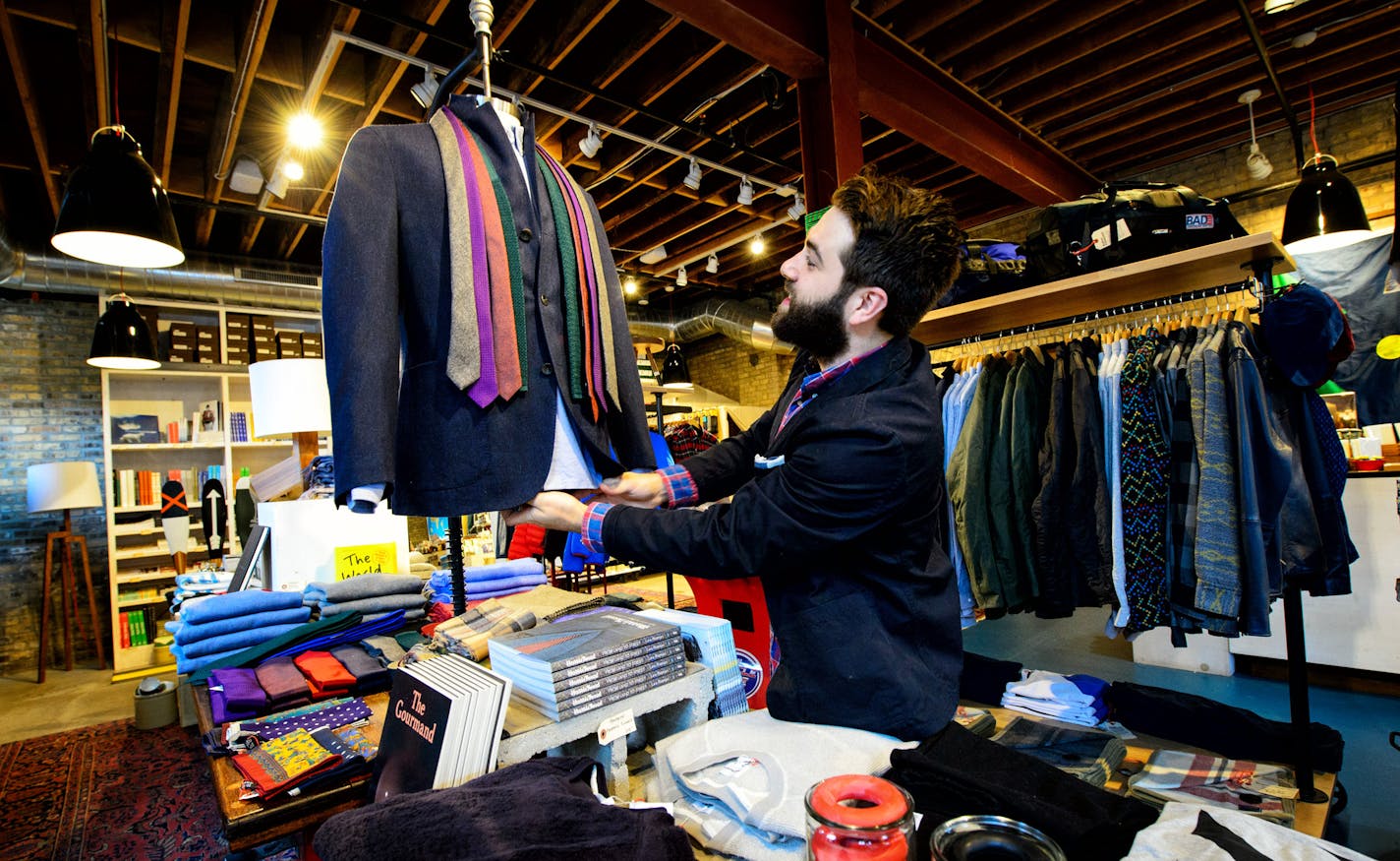 Arthur Oxborough, Askov Finlayson store manager, worked on a display.