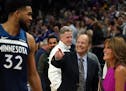 Timberwolves center Karl-Anthony Towns was congratulated by team owner Glen Taylor and his wife Becky after a win over the Golden State Warriors
