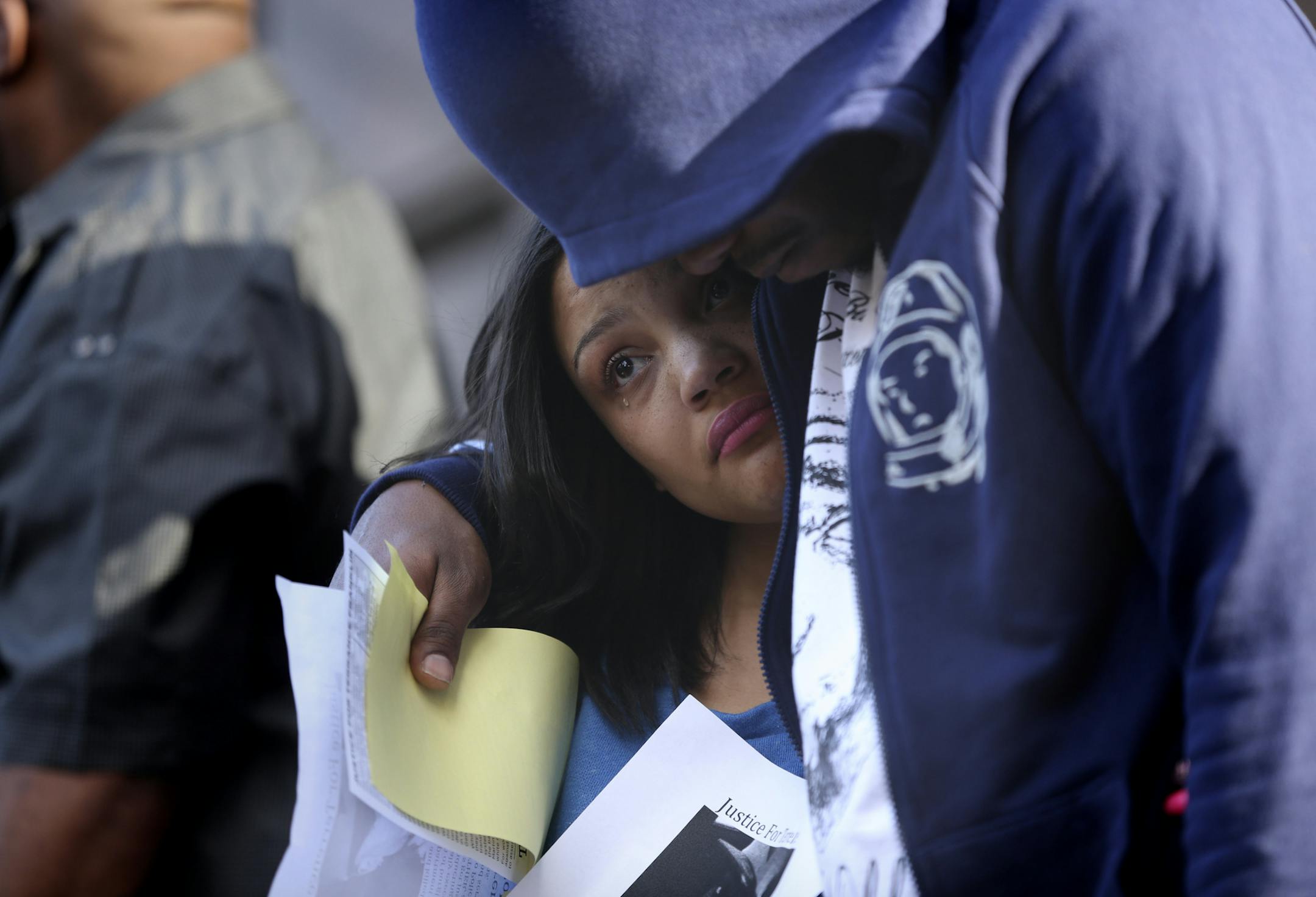 Both Myriah Elliott and Jonathan O'Neal, first cousins of Terrence Franklin, teared up during a rally for Franklin, who was shot and killed by police at the Hennepin County Government Center in Minneapolis Min., Friday, May 31, 2013. ] (KYNDELL HARKNESS/STAR TRIBUNE) kyndell.harkness@startribune.com