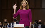 Supreme Court nominee Amy Coney Barrett is sworn in during a confirmation hearing before the Senate Judiciary Committee, Monday, Oct. 12, 2020, on Cap