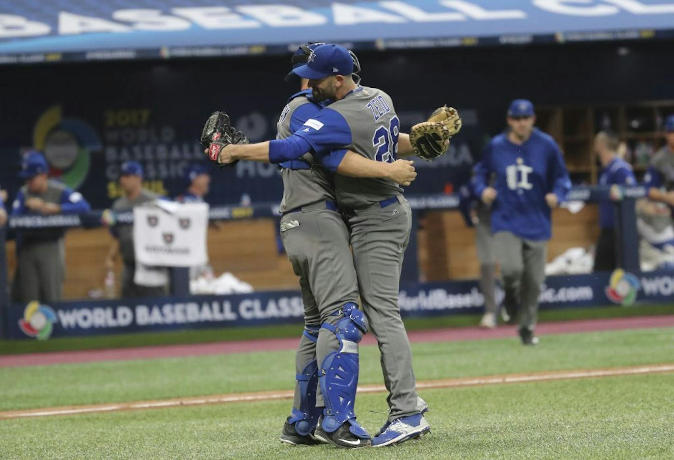 Israel's pitcher Josh Zeid, right, celebrates his team's victory with catcher Ryan Lavarnway against South Korea after the first round game of the World Baseball Classic at Gocheok Sky Dome in Seoul, South Korea, Monday, March 6, 2017.