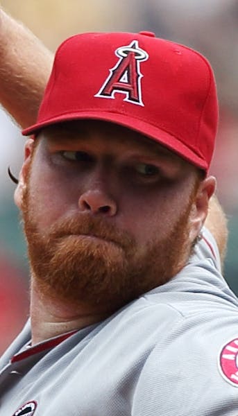 Los Angeles Angels' Tommy Hanson pitches in the first inning of the first game of a baseball doubleheader against the Boston Red Sox in Boston, Saturd