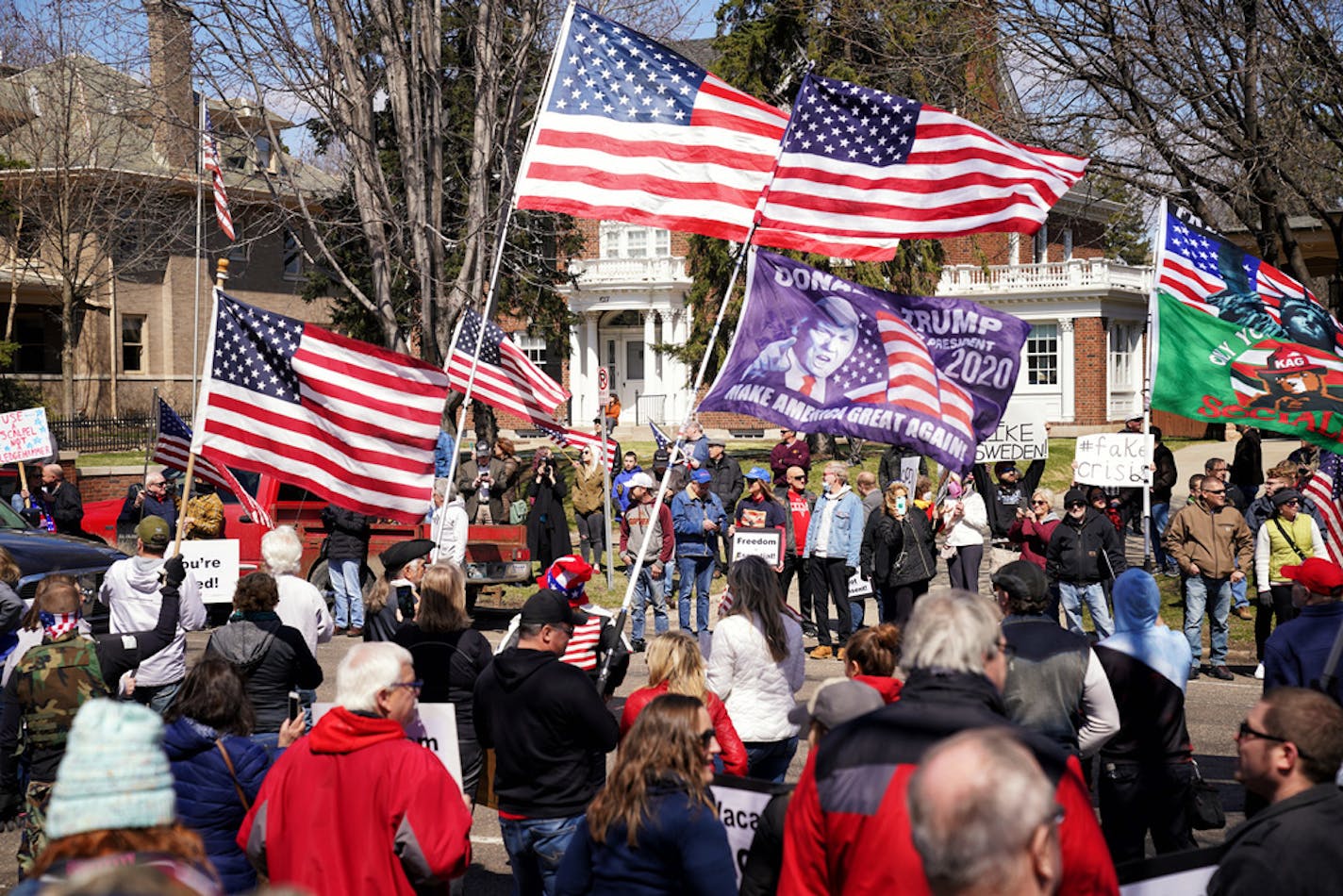 Hundreds of protesters gathered Friday outside the Minnesota Governor's Residence in St. Paul.