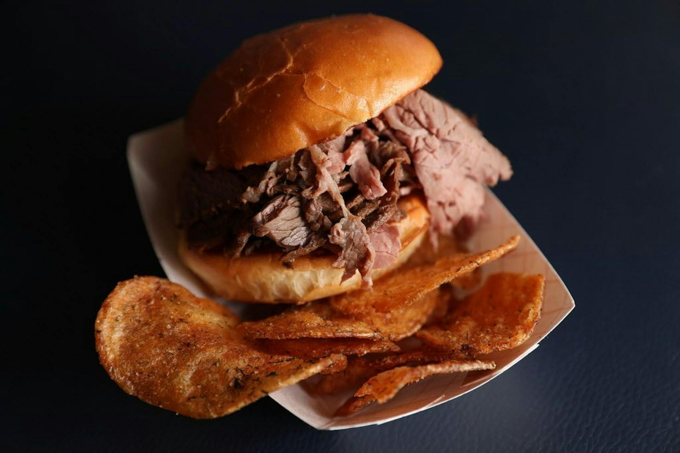 Pictured is the Murray's Steakhouse fresh-shaved smoked beef sandwich taken during a sneak preview of the new food concepts being unveiled at Target Field.