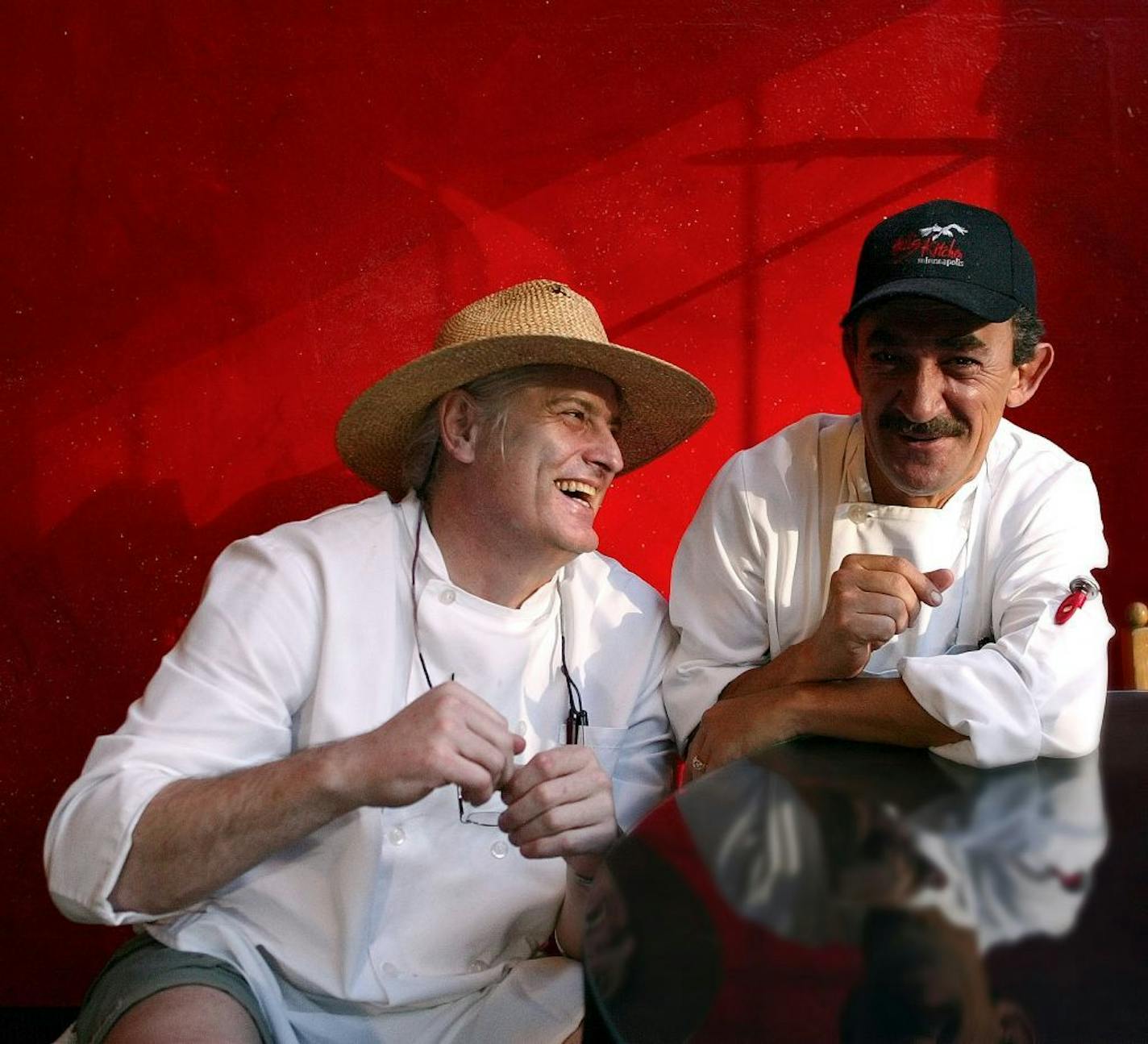 Chef owner Mitch Omer, left, and his partner Steve Meyer in the dining room of Hell's kitchen in 2006. Omer died unexpectedly on Friday.