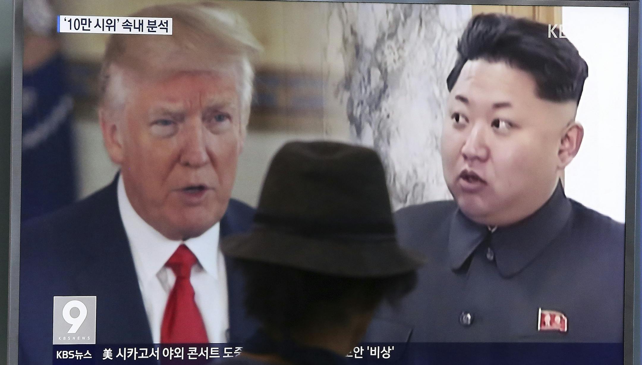 A man watches a television screen showing President Donald Trump and North Korean leader Kim Jong Un during a news program at the Seoul Train Station in Seoul, South Korea, Thursday, Aug. 10, 2017. President Donald Trump issued a new threat to North Korea on Thursday, demanding that Kim Jong Un's government "get their act together" or face extraordinary trouble. He said his previous "fire and fury" warning to Pyongyang might have been too mild. (AP Photo/Ahn Young-joon)