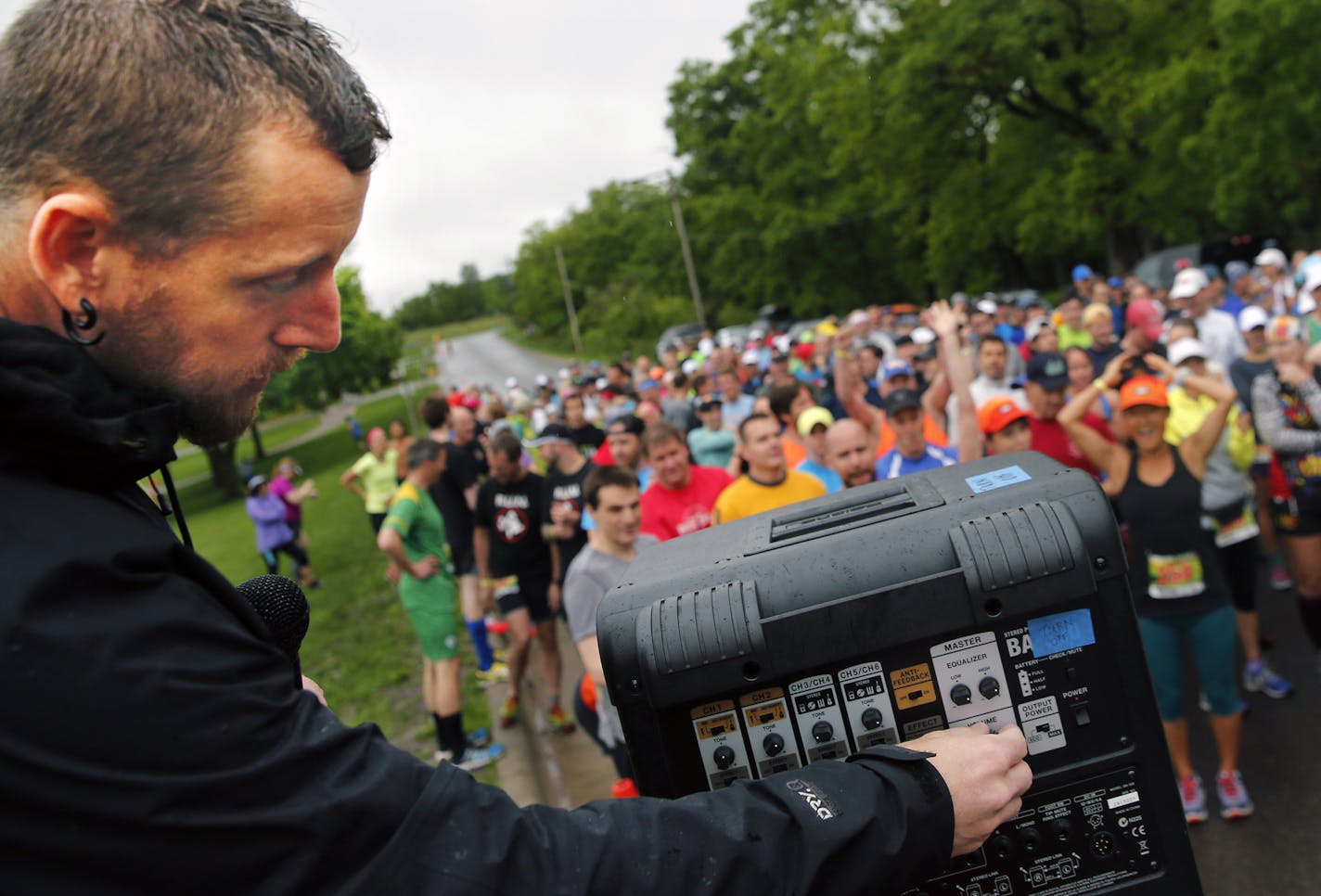 At the Lebanon 10K trail race held at Lebanon Hills Park, race director John Storkamp gets ready to get the race started.