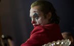 This image released by Warner Bros. Pictures shows Joaquin Phoenix in a scene from "Joker," in theaters on Oct. 4. (Niko Tavernise/Warner Bros. Pictur