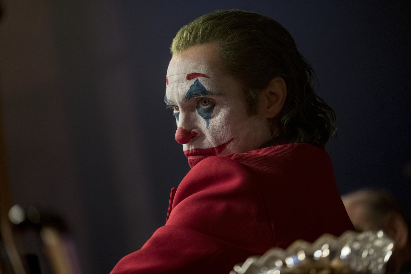 This image released by Warner Bros. Pictures shows Joaquin Phoenix in a scene from "Joker," in theaters on Oct. 4. (Niko Tavernise/Warner Bros. Pictures via AP)