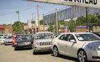 A dealer in used cars in the Woodside neighborhood of Queens in New York. (Richard B. Levine/Sipa USA/TNS) ORG XMIT: 1198936