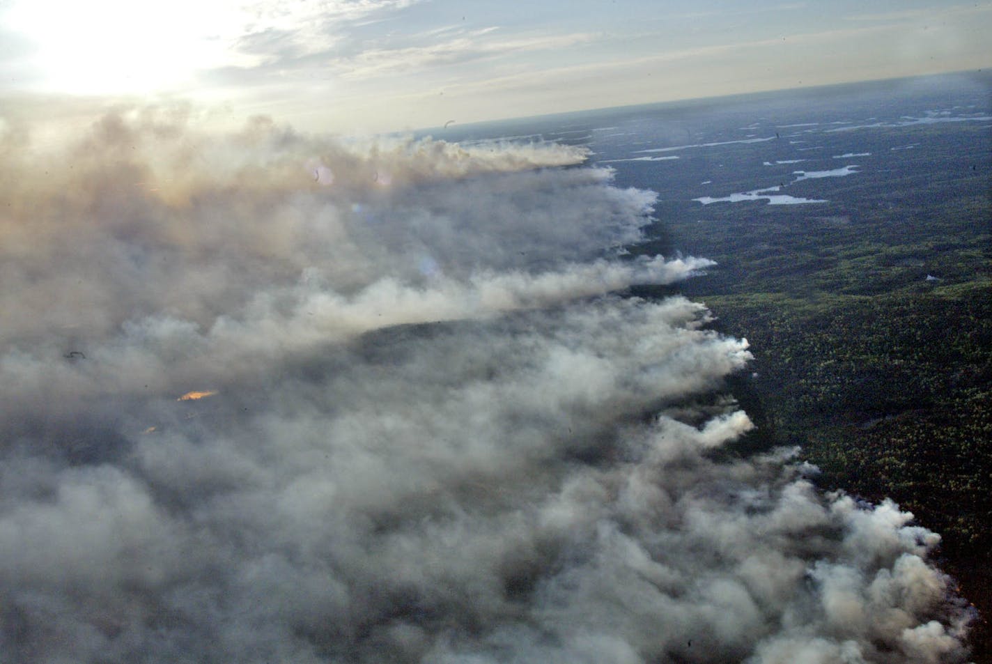 Fire danger is currently high along the Canadian border, including the Boundary Waters area. Here, a fire burned in 2007 at Gunflint Lake. ORG XMIT: MIN2014070414572561