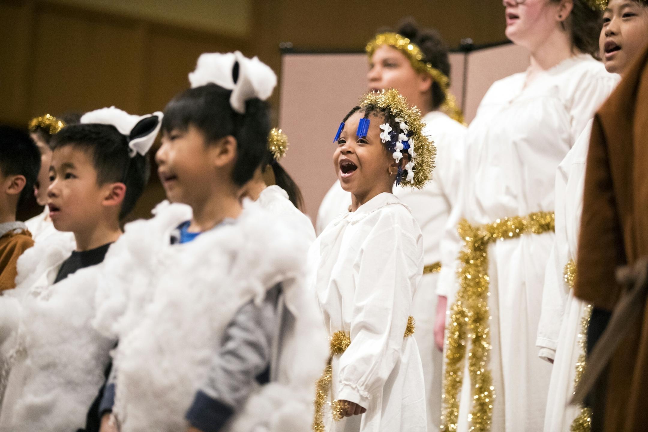 Brooklynn Scarver, 4, (who's birthday is on Christmas Day) sings during the annual children's Christmas pageant.