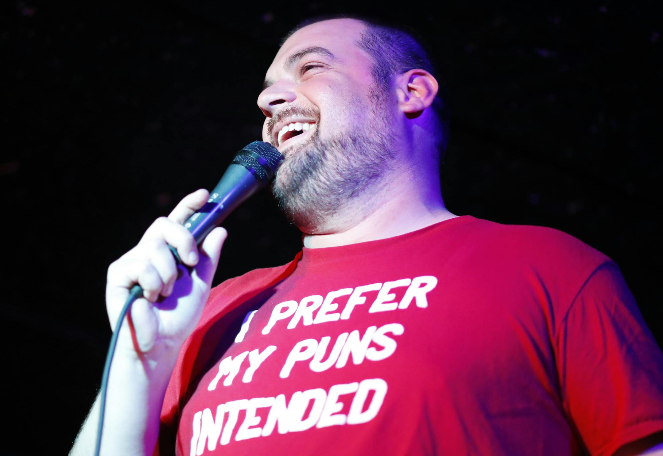 From top left, clockwise: competitor Christine Hottinger of Minneapolis, competitor Kyle DeGoey of St. Paul and host Art Allen in Pundamonium: The Twin Cities Pun Slam.