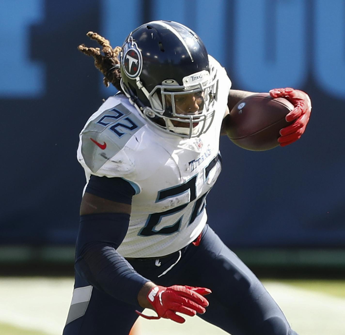 Tennessee Titans running back Derrick Henry (22) runs past Jacksonville Jaguars cornerback C.J. Henderson (23) in the second half of an NFL football game Sunday, Sept. 20, 2020, in Nashville, Tenn. (AP Photo/Wade Payne)