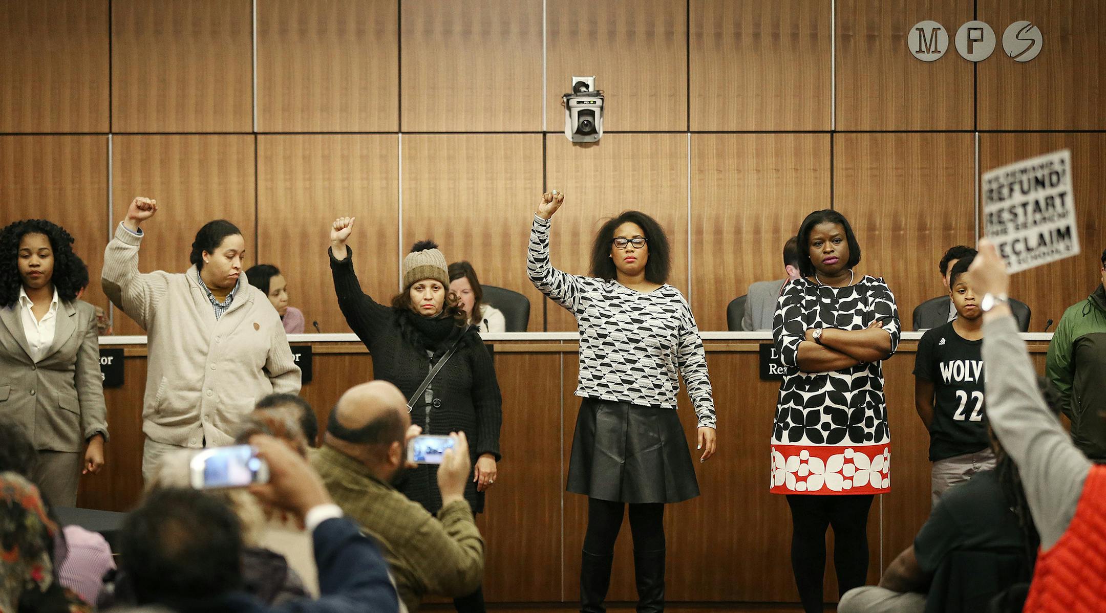 In the midst of a motion to select interim superintendent Michael Goar as the board's preferred candidate, protestors shut down the school board meeting. Tuesday January 12, 2016 in Minneapolis, MN. ] The Minneapolis school board will decide the fate of Sergio Paez, the man they selected to the lead the district. Jerry Holt/Jerry.Holt@Startribune.com ORG XMIT: MIN1601122113020553