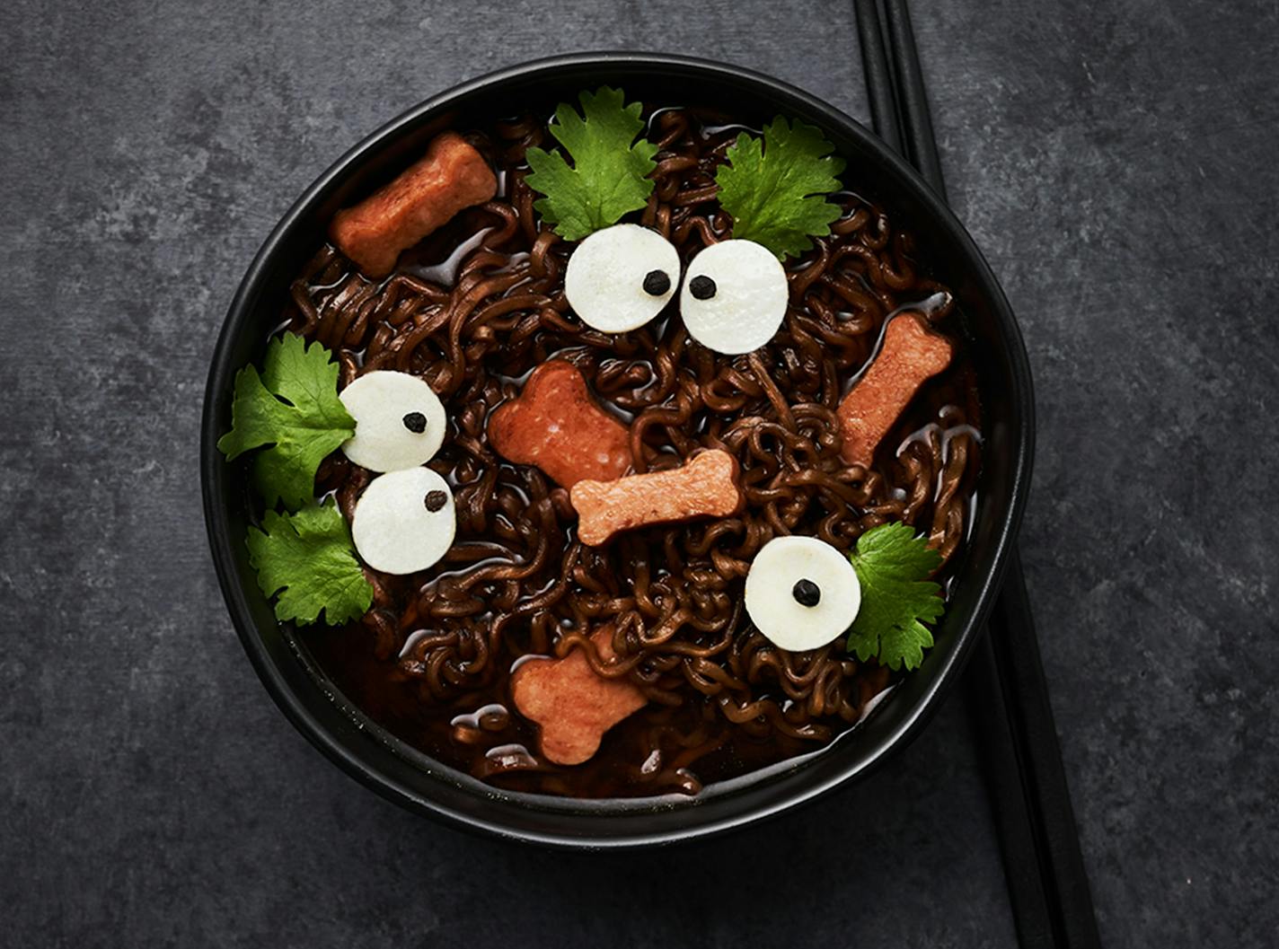 A little black food dye can add a spooky feel to classic ramen. Photo provided by Maruchan.