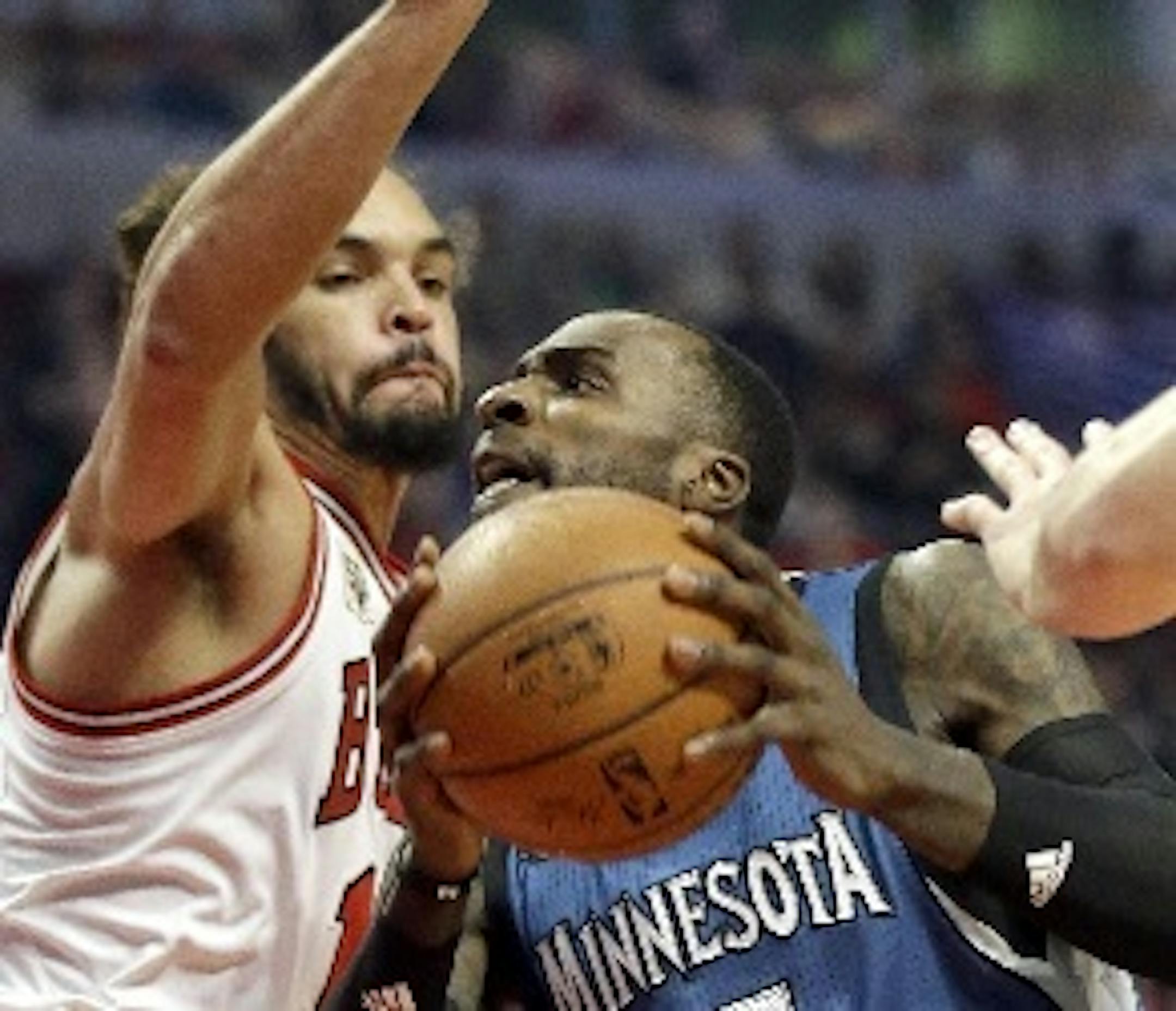 Timberwolves forward Shabazz Muhammad, right