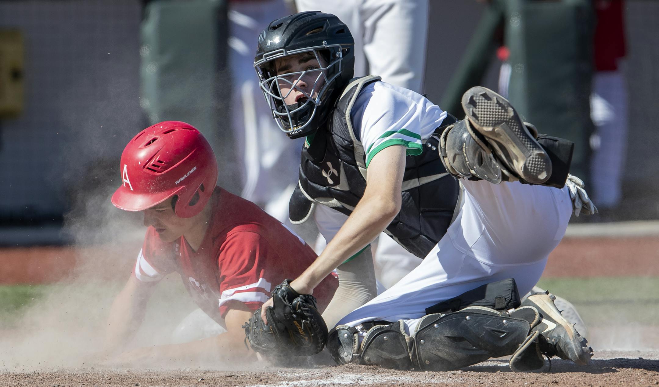 Nick Dunlap (13) of Austin was tagged out at the plate by Griffin Varley (15) of Hill Murray in the sixth inning. ] CARLOS GONZALEZ • cgonzalez@startribune.com – Minneapolis, MN – June 13, 2019, University of Minnesota Siebert Field, High School / Prep Baseball, Class 3A baseball state tournament quarterfinals, Austin vs. Hill-Murray