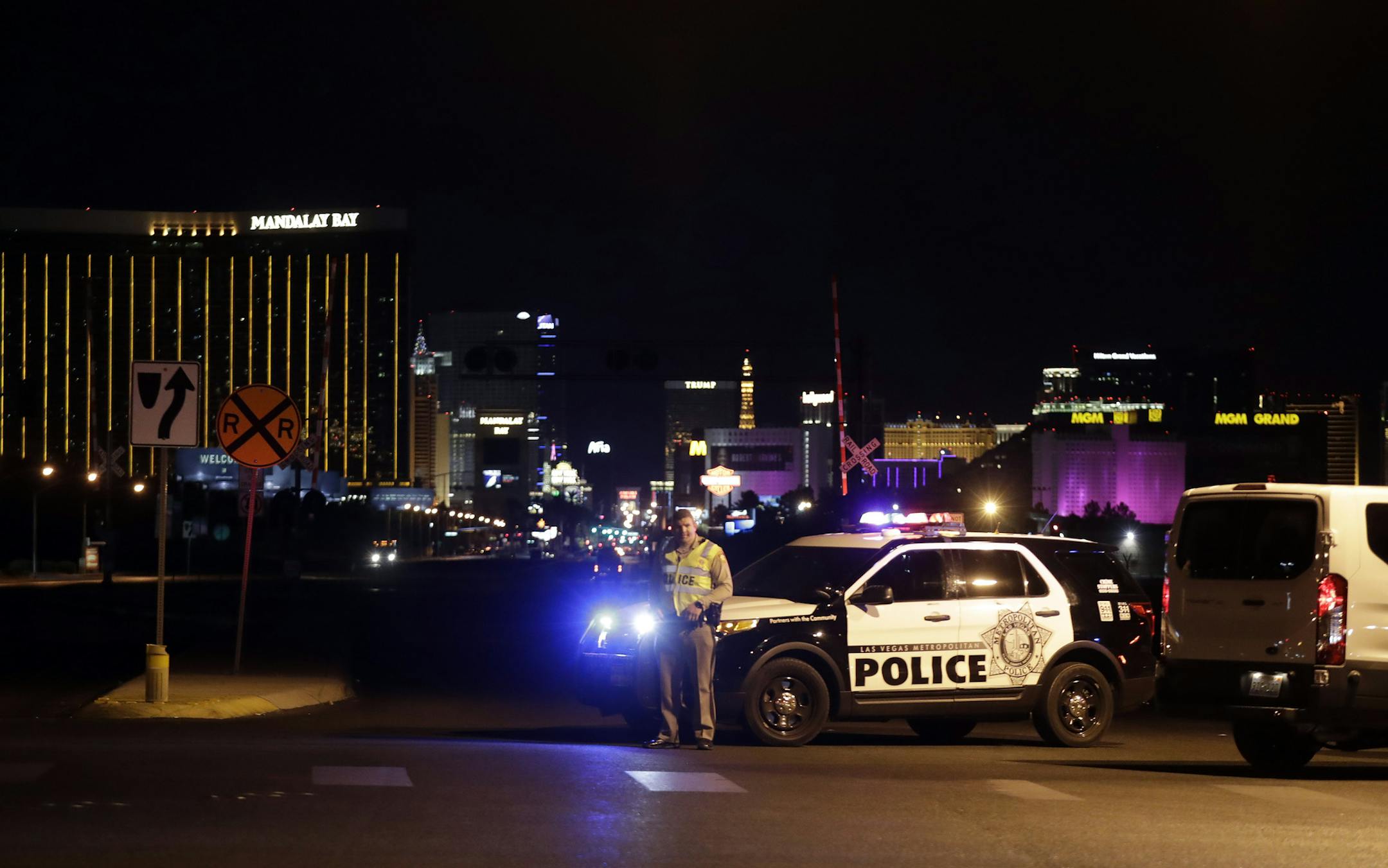 A police roadblock on the Las Vegas Strip early Monday morning, Oct. 2, 2017, after a gunman at a hotel rained a rapid-fire barrage on a huge outdoor concert festival nearby. The gunman – identified as 64-year-old Stephen Paddock – killed at least 50 people, and wounded hundreds of others, officials said. (Isaac Brekken/The New York Times)