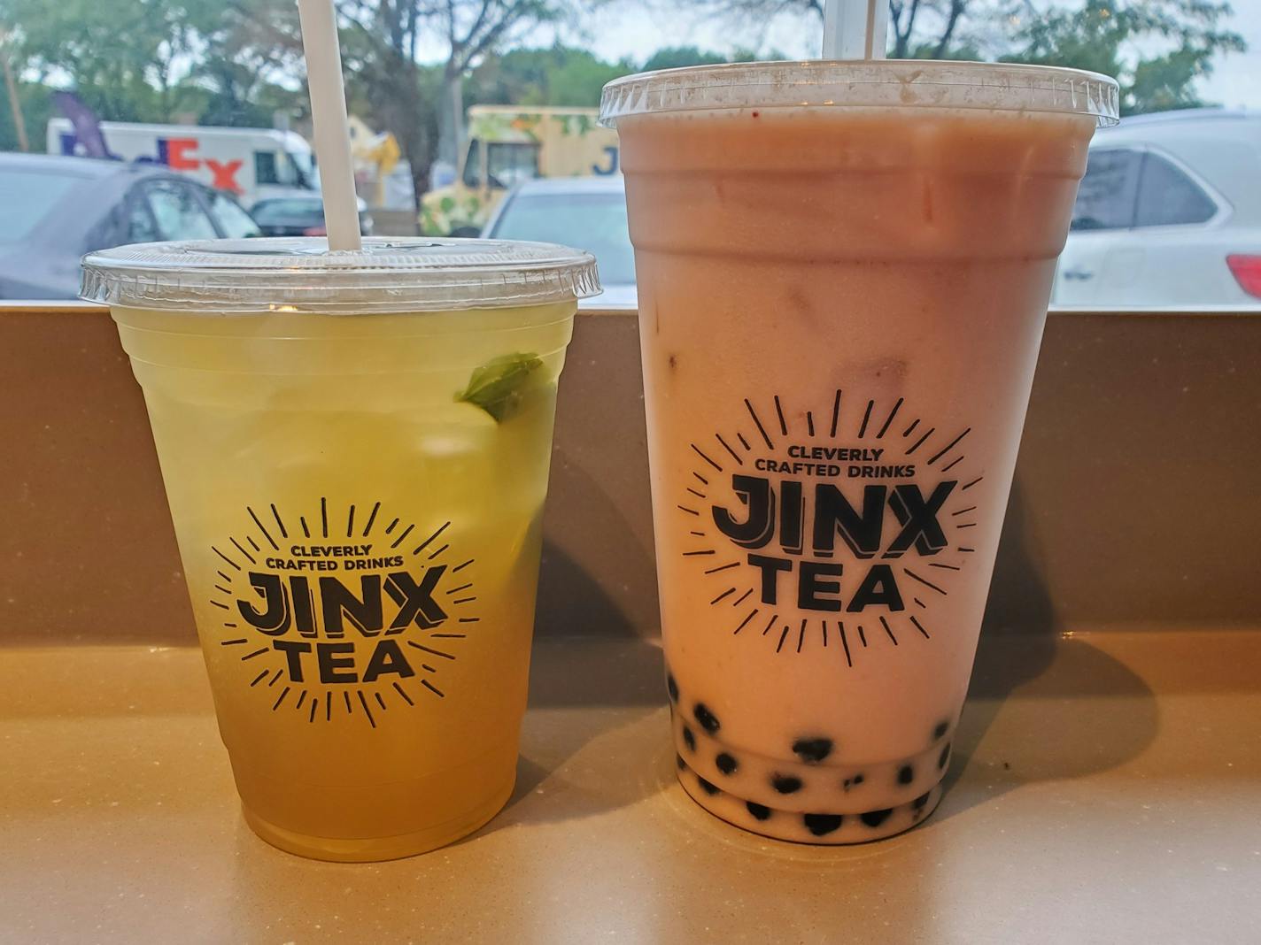 Drinks from Jinx Tea: Mojito (left) is made with Qilan Oolong tea, fresh mint and lime. Strawberry Dream bubble tea has black tea, cream, strawberry, rosewater and boba.