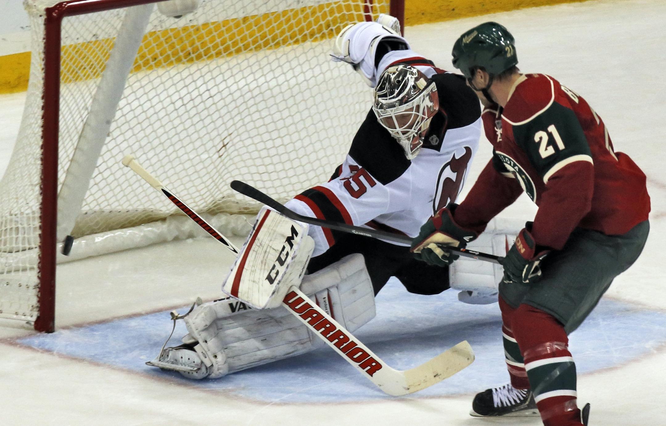 The Wild's Kyle Brodziak just missed beating Devils goalie Cory Schneider on a third-period shot.