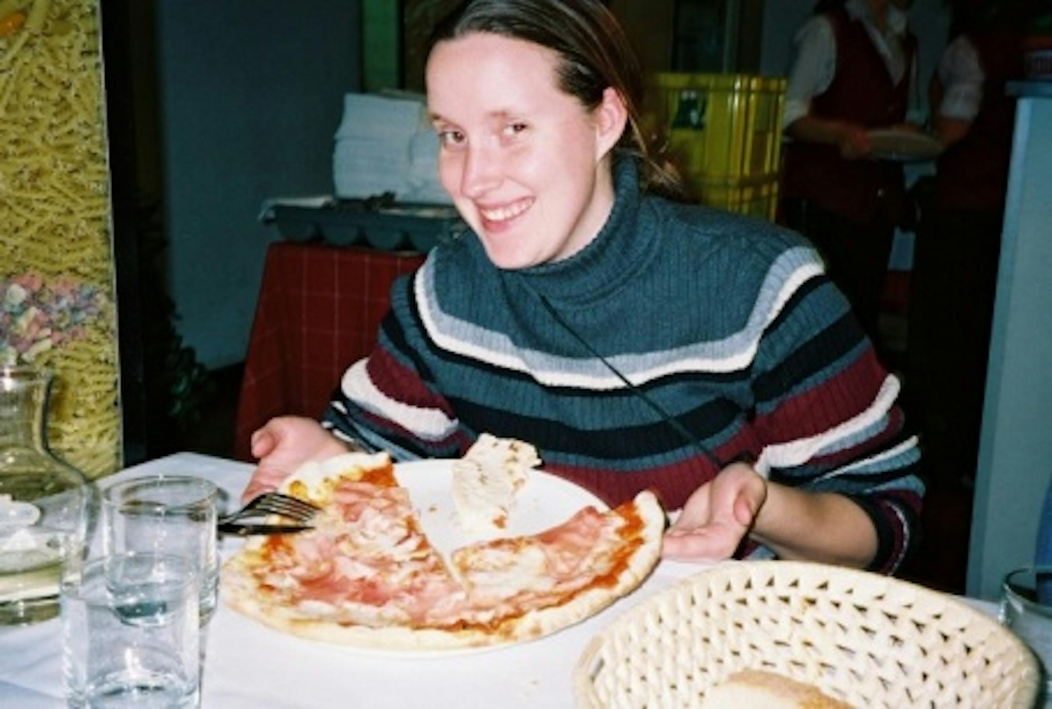 Erin enjoying one of many pizzas in Italy. We had at least one a day while there. Good thing we walked a lot!