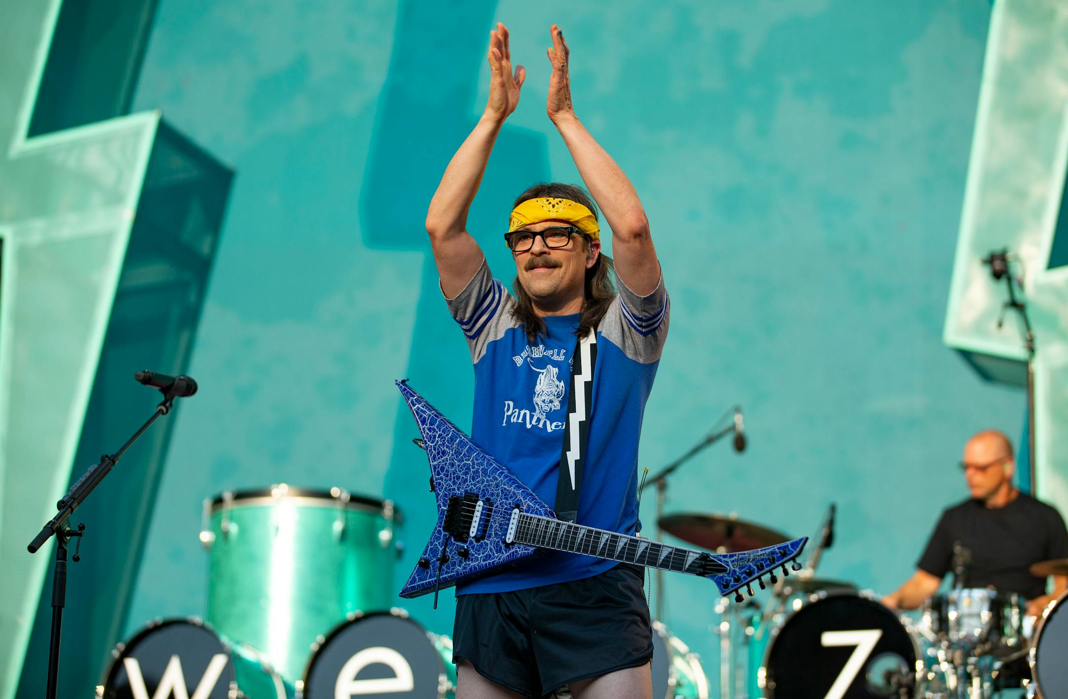 Rivers Cuomo, lead singer of Weezer, encouraged fans to start clapping during the band's set at Target Field as part of the Hella Mega Tour on Monday evening.