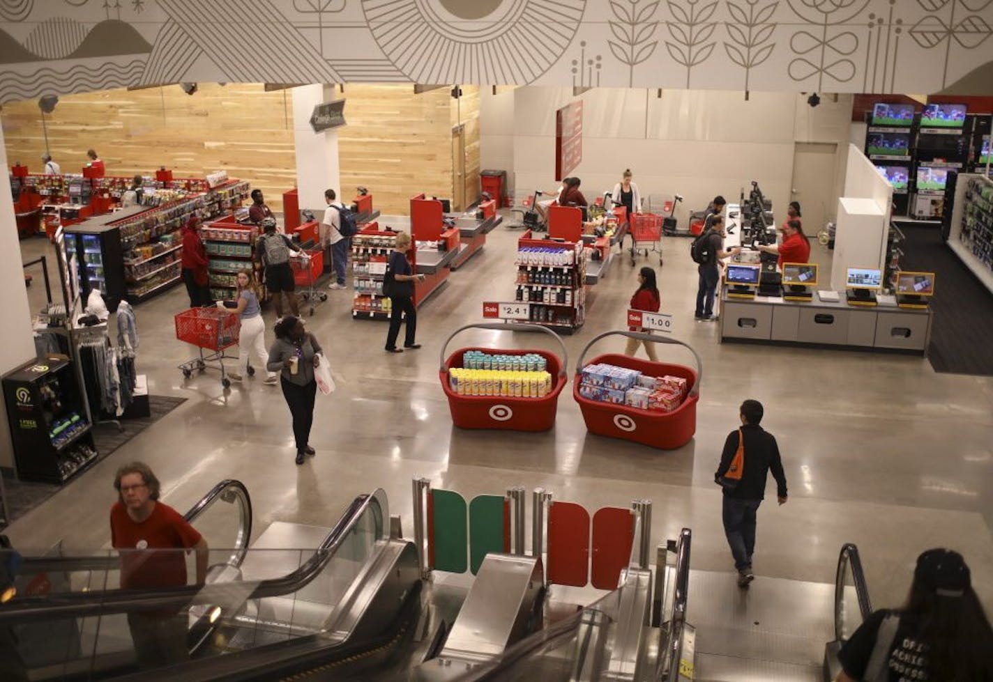 Giant shopping bins display specials near the checkout area on the street level of the Target store in downtown Minneapolis.